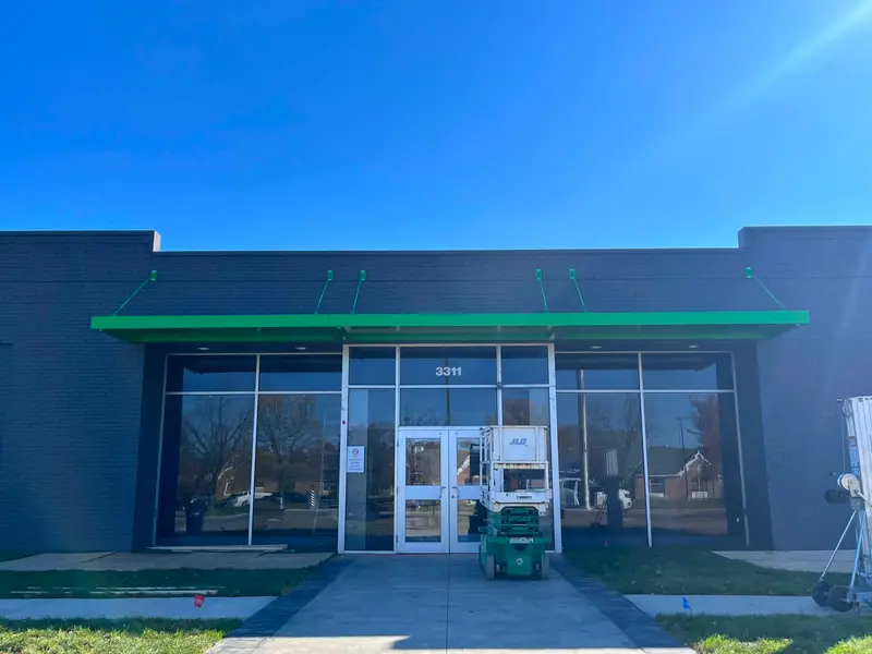 Cantilevered metal canopy built by Metal AP for a Central Ohio property